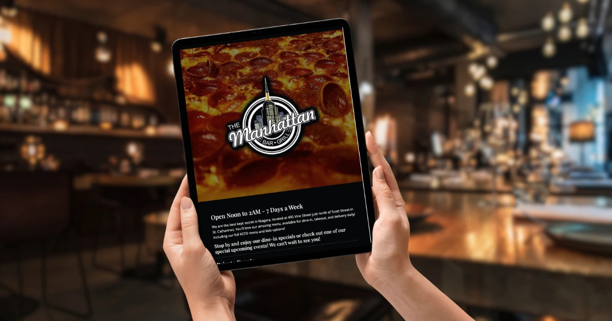 Your restaurant needs a website. Picture of a tablet with a professional restaurant website with these words, over the background of an elegant restaurant backdrop.