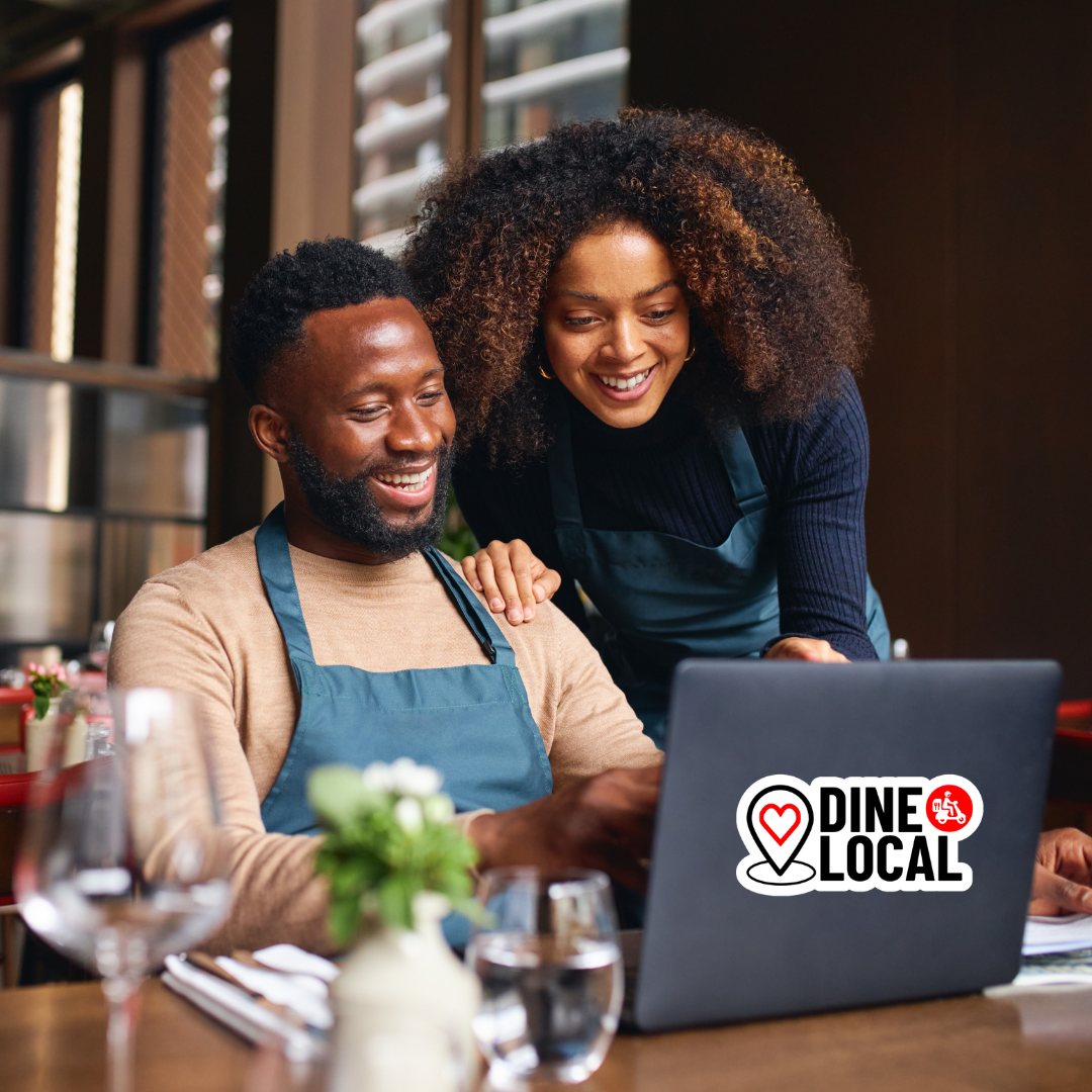 Restaurant owners smile while reviewing the reports from their Dine Local online ordering system which gives them detailed information about their customers, product preferences, and sales.