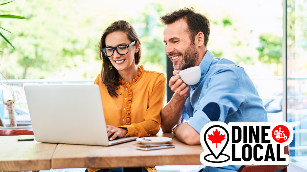 Restaurant owners smiling as they easily update their Dine Local restaurant website for upcoming events.